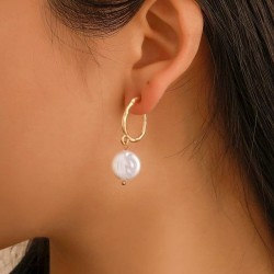 Pendientes dorados con...