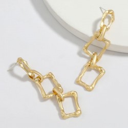 pendientes dorados geometricos