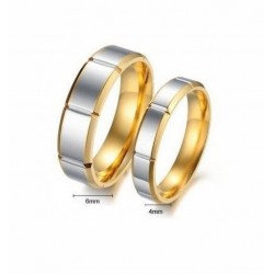 Alianzas de parejas chapadas en oro con satinado gris de acero inoxidable