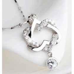 Collar para mujer fabricado en acero chapado en plata con cadena de 51 cm de largo y piedras de cristal blanco