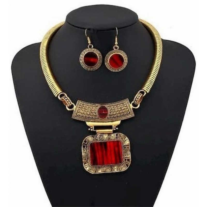 Impresionante Conjunto dorado de collar y pendientes con piedras rojas y blancas