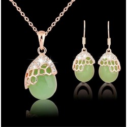 Conjunto dorado con cristal...