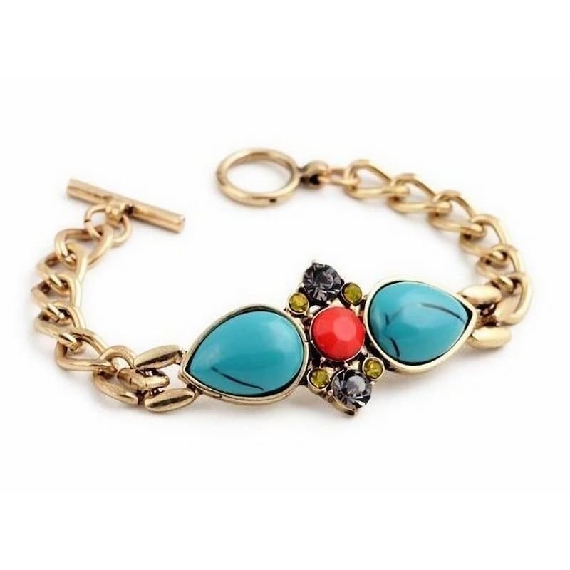 Pulsera de bronce con piedras de cristal facetadas en varios colores y cierre de seguridad.