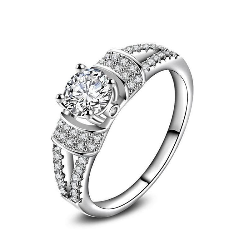 Alianza de compromiso de plata de ley 925 con circonia de color blanco y pequeños cristales