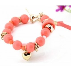 Bisutería de cuentas, pulsera de resina y acero de color dorado