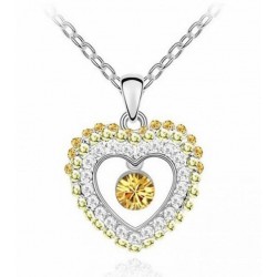 Collar de acero acabado en oro con piedra citrino de corazón y cristales varios