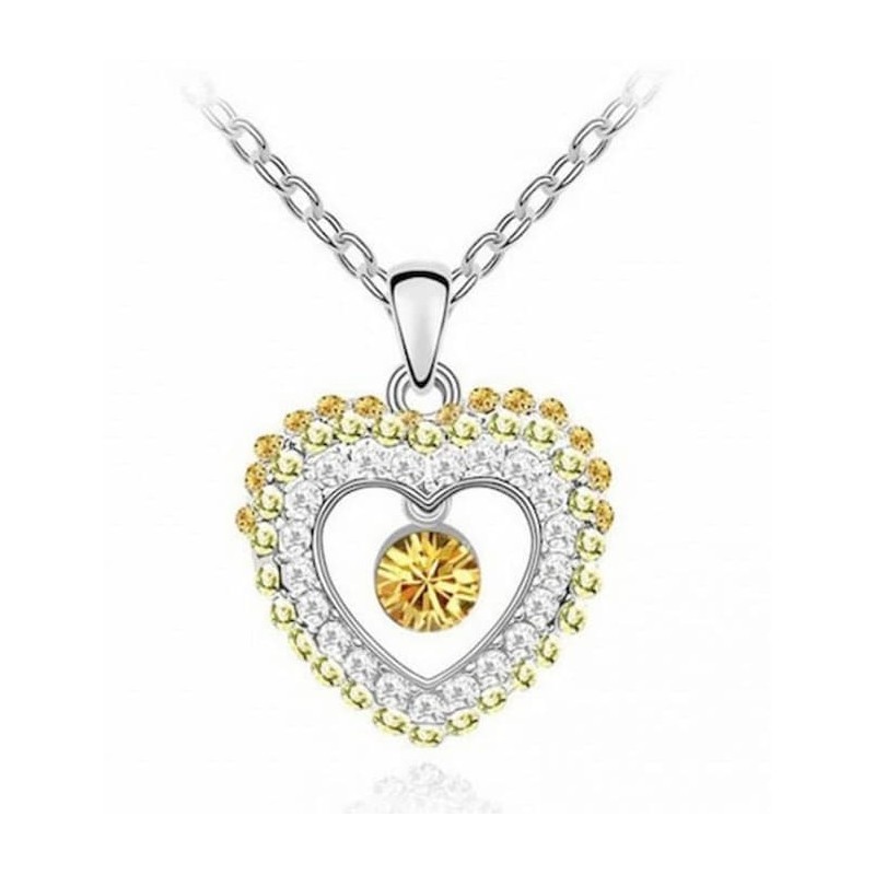 Collar de acero acabado en oro con piedra citrino de corazón y cristales varios