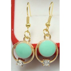 Pendientes de mujer con piedra redonda de color turquesa y cristal blanco