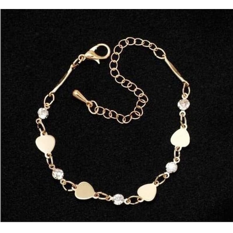 Cadena de bisutería de 17 cm con incrustaciones de cristales facetados para uso como pulsera o tobillera.