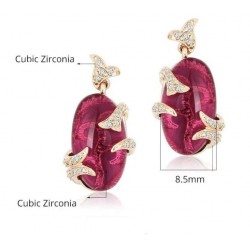 Pendientes de acero chapados en oro con circonia roja y pequeñas piedras de cristal