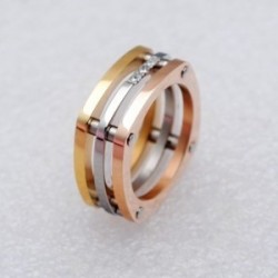 Anillo de tres capas en dos colors con circonias blancas