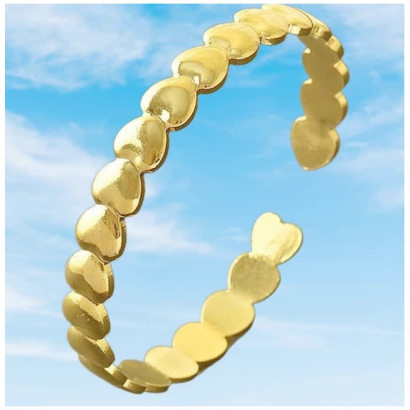 Pulsera rígida abierta para mujer en color oro con dos corazones en los extremos, fabricada en acero inoxidable.