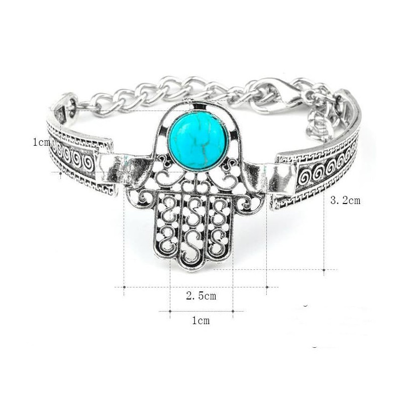 Pulsera articulada de acero inoxidable con el amuleto de la Mano de Fátima calado en la pieza central.