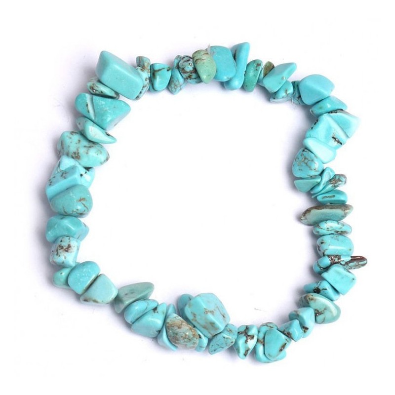 Pulsera elástica de cuentas esféricas en color turquesa con vetas naturales y detalles metálicos plateados.