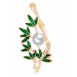 BROCHE CON perla blanca...