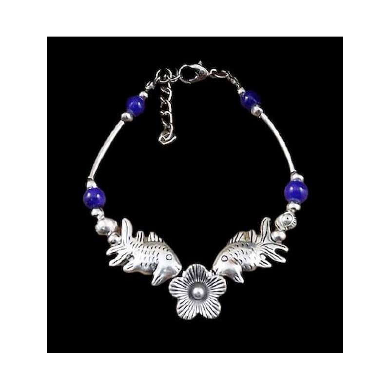 Brazalete rígido para mujer con diseño vintage labrado en acero inoxidable de nuestra sección outlet.