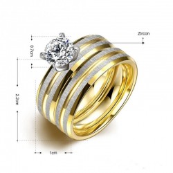 Set de alianzas de acero de titanio con gran circón central de color blanco