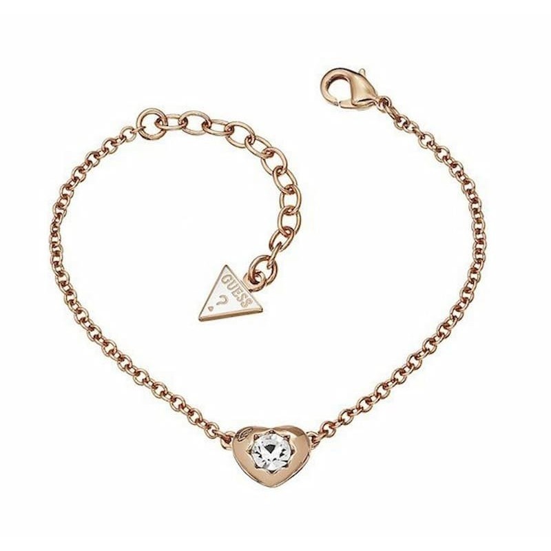 Pulsera de la marca Guess original con baño de oro rosa y detalle de logotipo con cristales brillantes.
