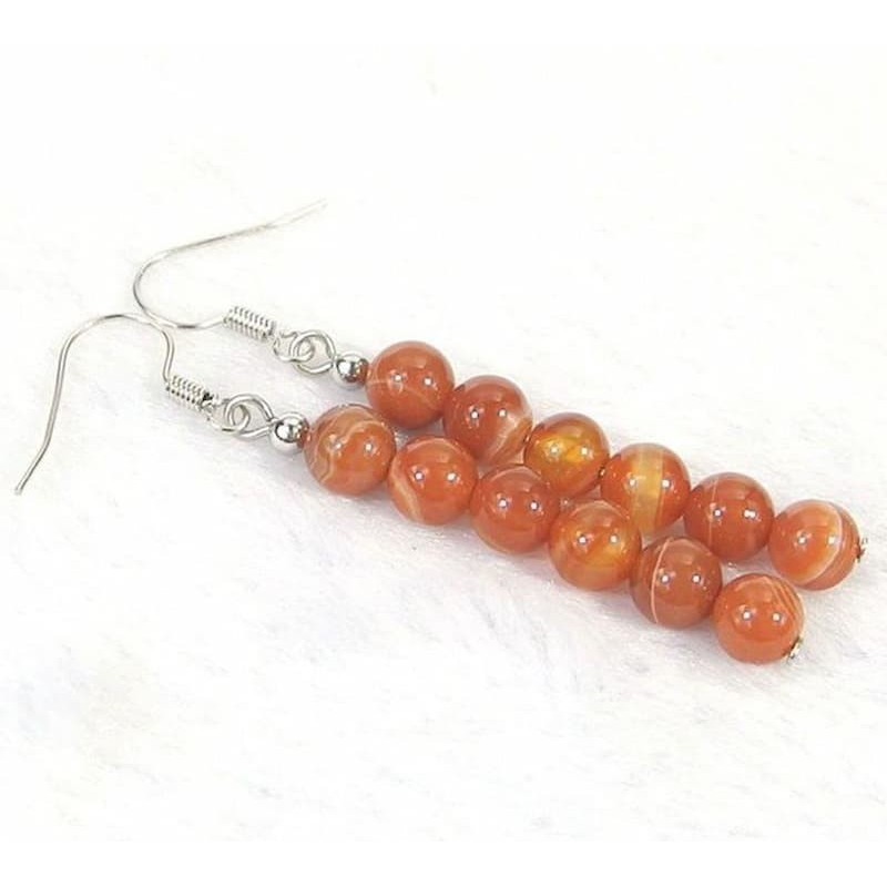 Pendientes para mujer con baño de plata y seis piedras de imitación ágata en tonos naturales.