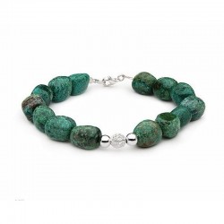 Pulsera de cadena fina en plata de ley 925 decorada con piedras turquesas naturales de color azul vibrante.