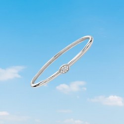 Pulsera tipo esclava de plata de ley 925 maciza con incrustaciones de piedras preciosas blancas de talla brillante.
