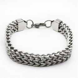 Pulsera masculina de eslabones anchos (13 mm) fabricada en acero inoxidable con acabado pulido brillante.