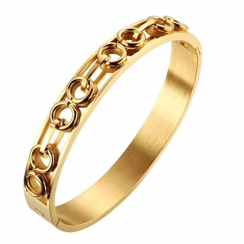 Brazalete tipo esclava para hombre fabricado en acero inoxidable con eslabones redondos entrelazados y acabado pulido.