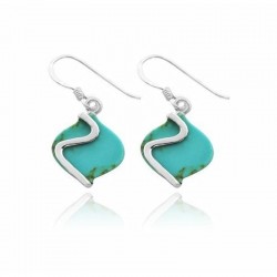 Exclusivos pendientes de novia fabricados en plata de ley 925 con piedras de turquesa azul y sutiles detalles en color verde.