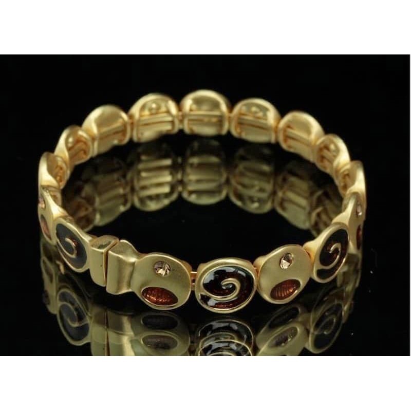 Pulsera con cierre magnético Talara de acero bañado en oro y piedras topacio