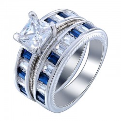 Par de anillos de acero chapado oro blanco con piedras símil zafiro en talla 17