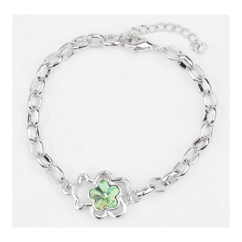 Brazalete de acero chapado en oro con oso verde