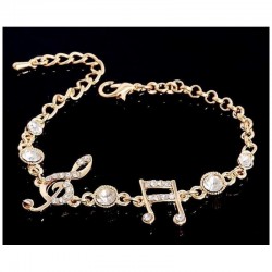 Pulsera con diseño de notas musicales bañada en oro 9k y cristal