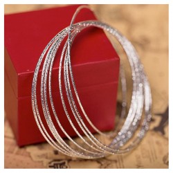 Set de ocho pulseras enlazadas bañadas en plata