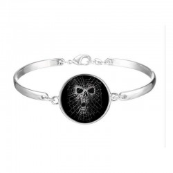 Pulsera articulada de acero con diseño de tela de araña