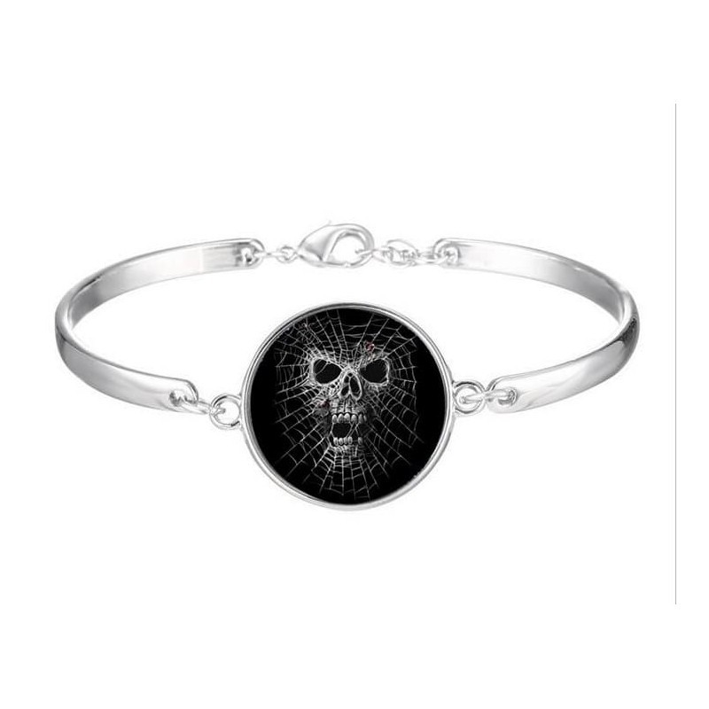 Pulsera articulada de acero con diseño de tela de araña