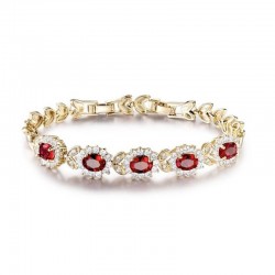 Pulsera de acero bañado en oro con piedras de cristal de color rojo rubí