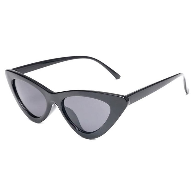 Gafas de sol para mujer estilo ojo de gato, montura negra, lentes oscuras con protección UV400, sobre fondo blanco