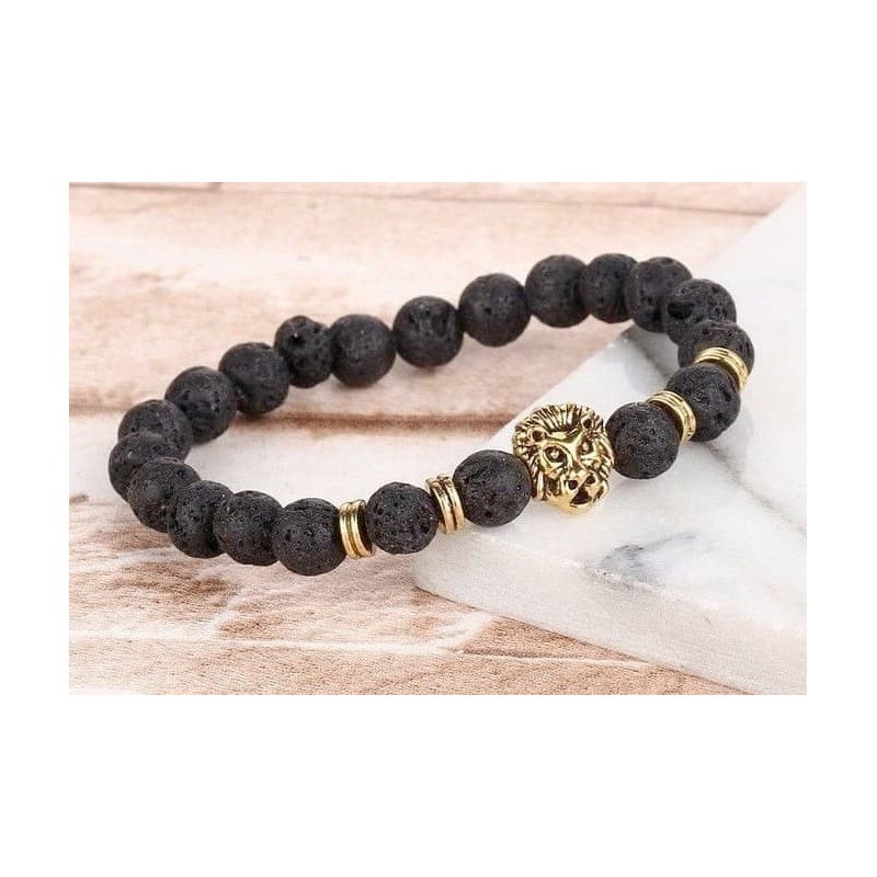 Pulsera elástica de piedras de lava volcánica negra con dije decorativo de cabeza de león en tono bronce