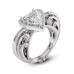 Anillo de acero inoxidable con gema central en forma de corazón color topacio para mujer.