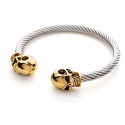 Pulsera elástica unisex con cuentas negras mate y detalle central de calavera plateada en acero.