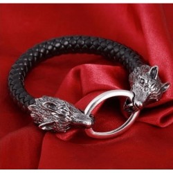 Pulsera de cuero negro trenzado para hombre con cabezas de lobo en acero inoxidable.