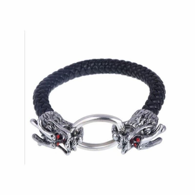 Pulsera de cuero negro trenzado para hombre con terminal en forma de cabeza de dragón detallada en acero.