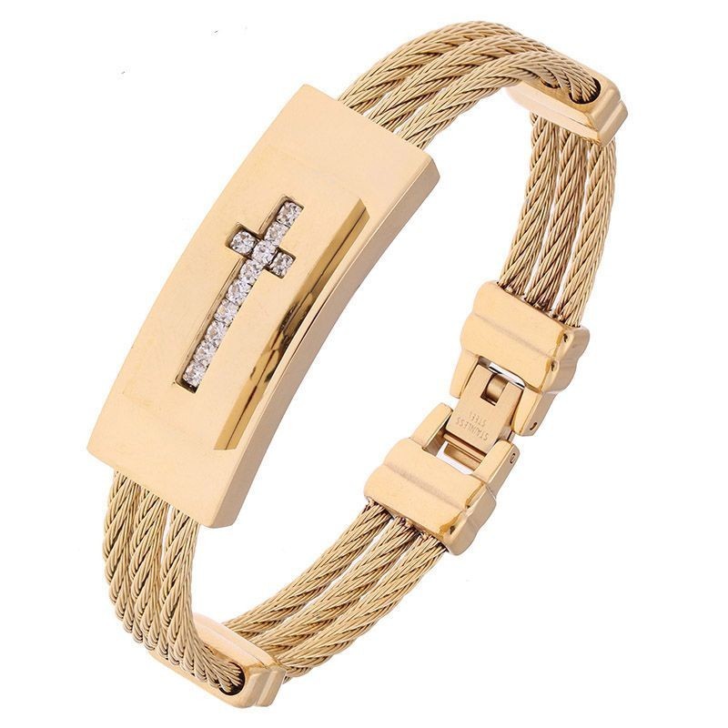Brazalete robusto para hombre fabricado en acero inoxidable con baño de oro de 18 quilates y cierre de seguridad.