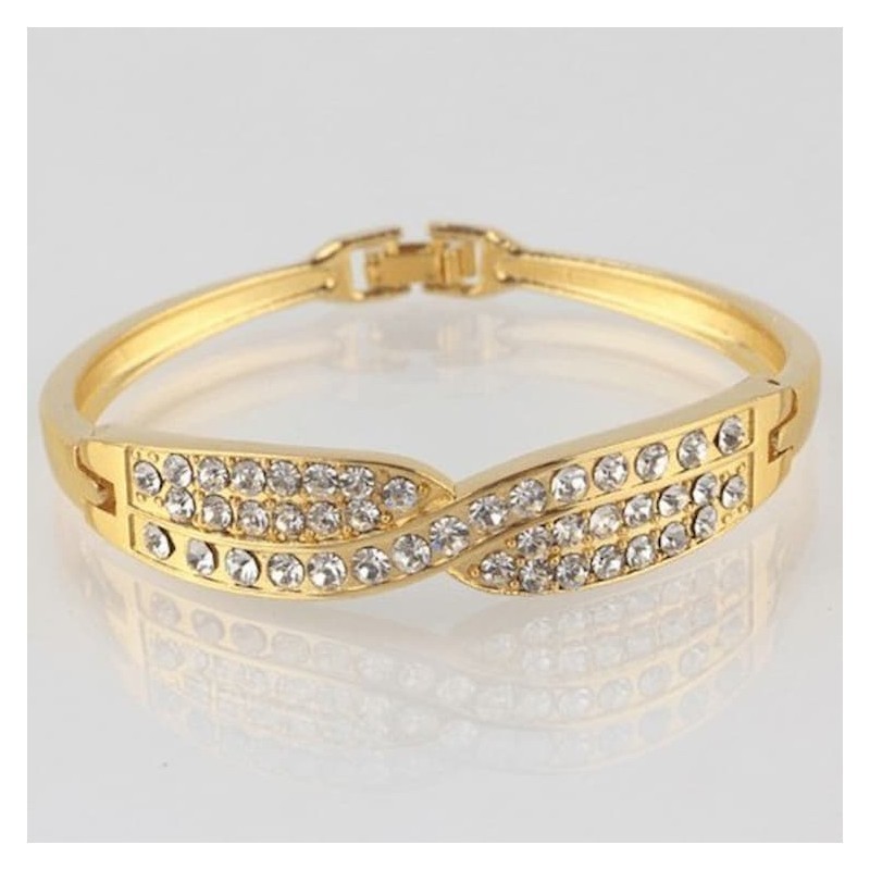 Pulsera para mujer con baño de oro de 18k y cristales austriacos engastados de alto brillo.