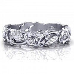 Anillo ancho de mujer con grabados de flores y hojas en relieve con acabado plata envejecida.