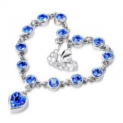 Pulsera de acero inoxidable para mujer con eslabones en forma de corazón y cristales de color azul zafiro.