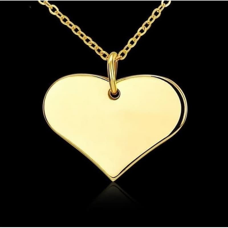 Collar de cadena fina de acero inoxidable con colgante de corazón grande liso con acabado pulido espejo en oro.