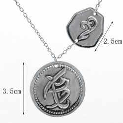 Collar de acero inoxidable con colgante circular y grabado de runa tibetana